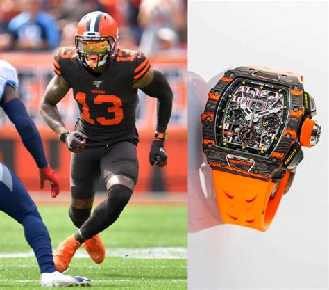 obj wears fake watch